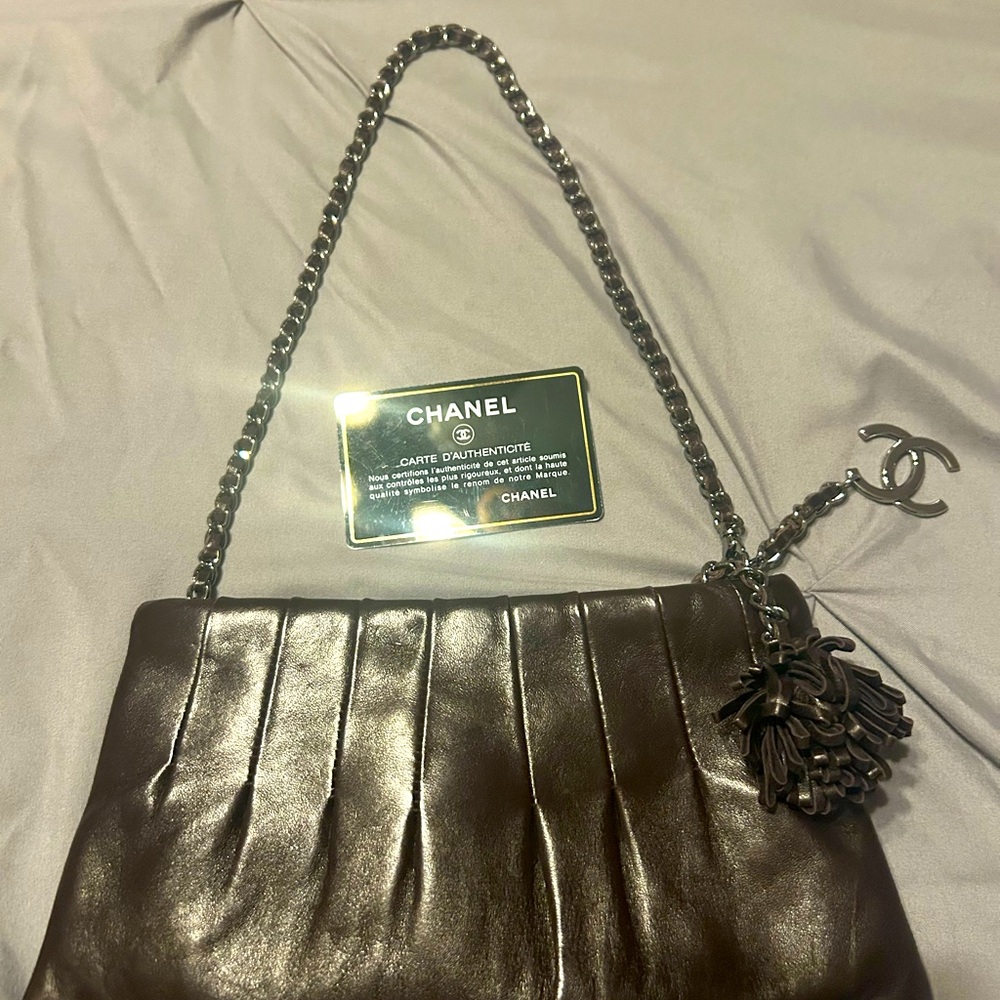 Authentic Chanel small espresso evening leather bag. Rare collectors item.
